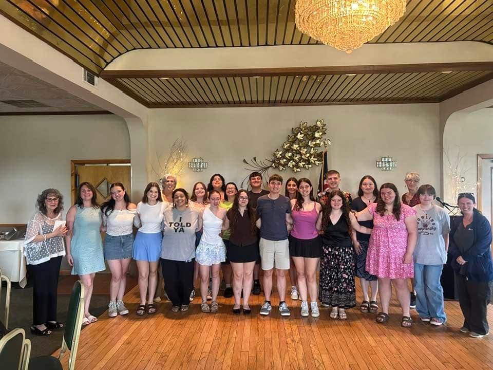 Students of the Coxsackie-Athens Interact Club standing together at their end-of-year recognition lunch.
